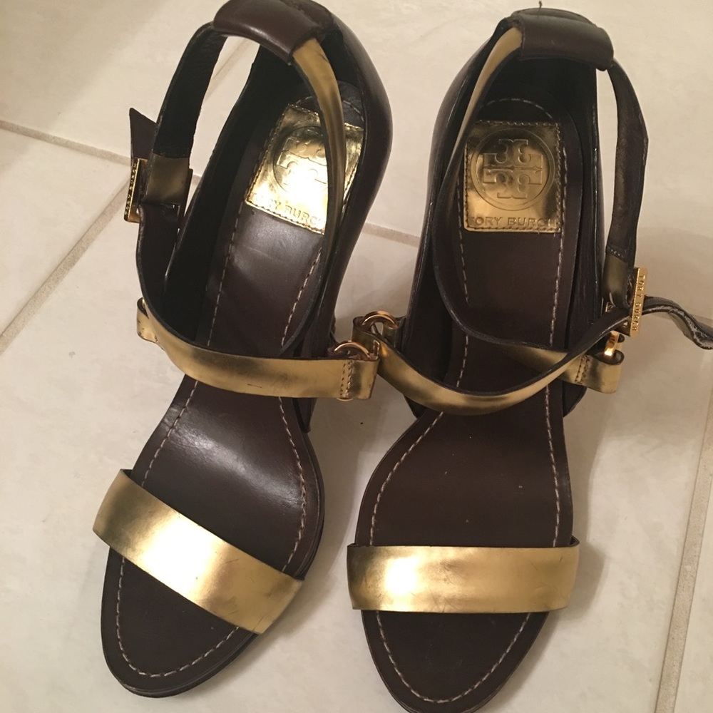 Brown and gold strappy heels.
